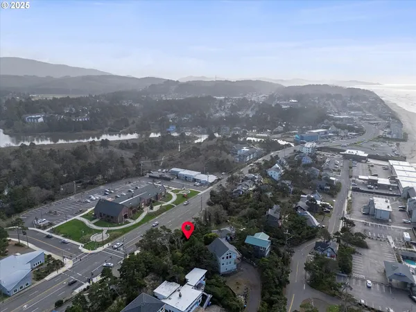 a view of a town with mountains in the background
