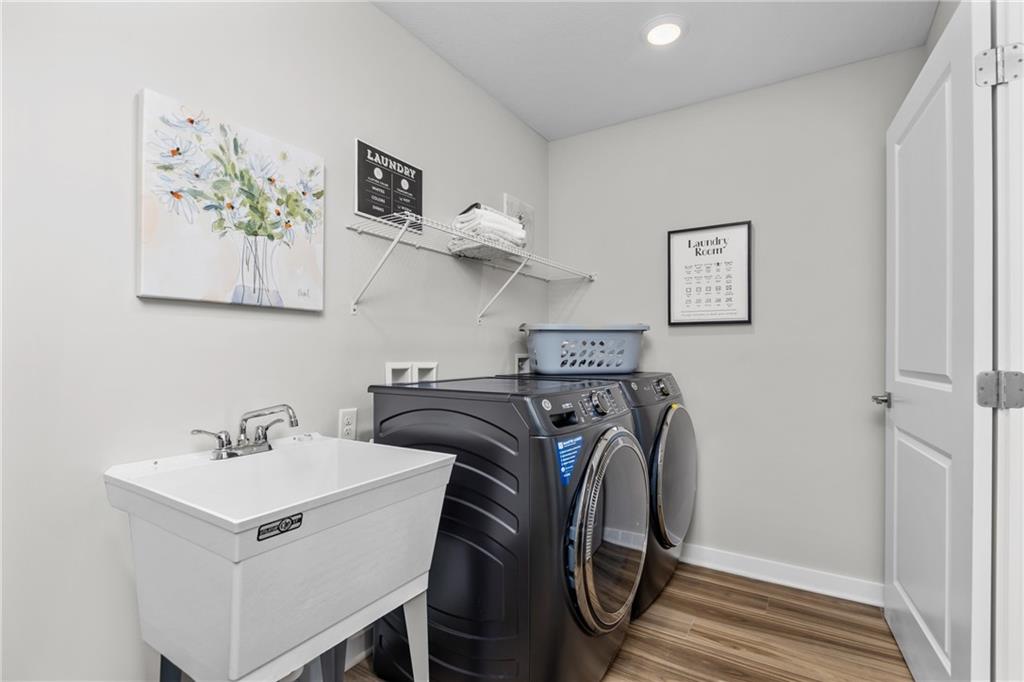 106 Independence Drive Cabot, PA 16023 - Photo 20 of 32 a utility room with multiple dryer and washer