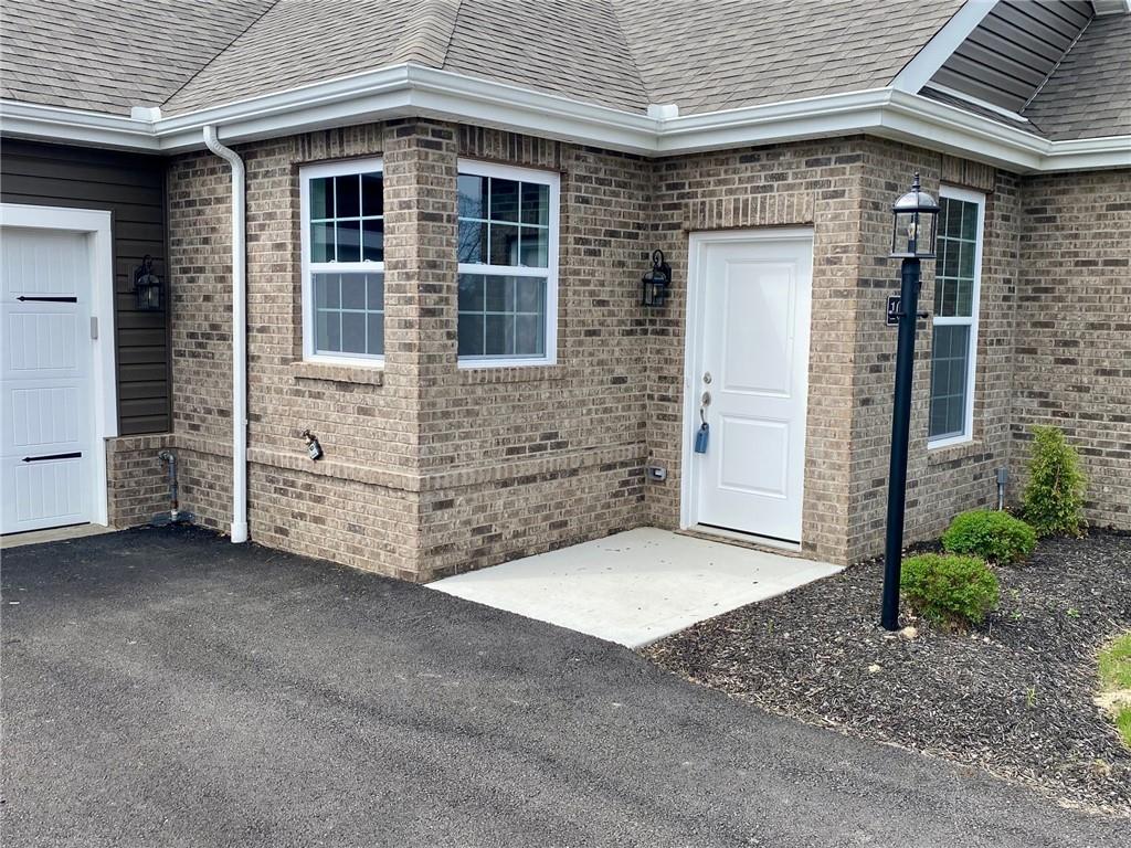 106 Independence Drive Cabot, PA 16023 - Photo 2 of 32 a view of a house with yard and garage