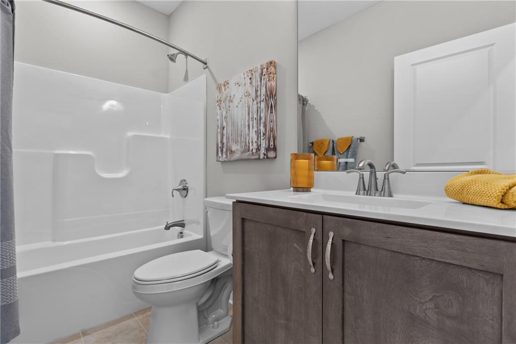 106 Independence Drive Cabot, PA 16023 - Photo 22 of 32 a bathroom with a sink a toilet and shower