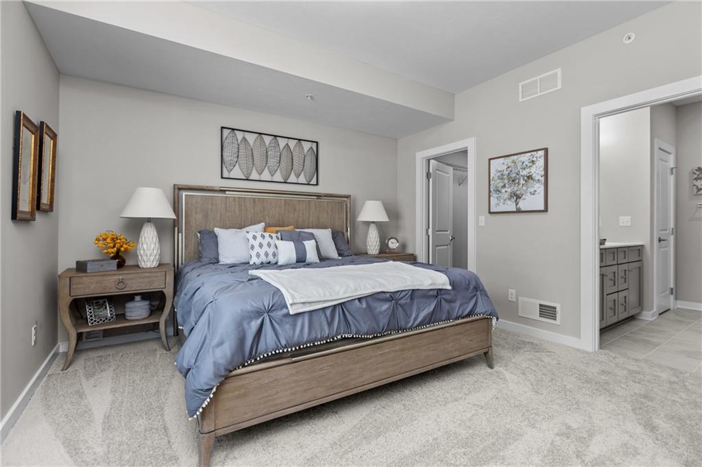 106 Independence Drive Cabot, PA 16023 - Photo 24 of 32 a bedroom with a bed and a chandelier