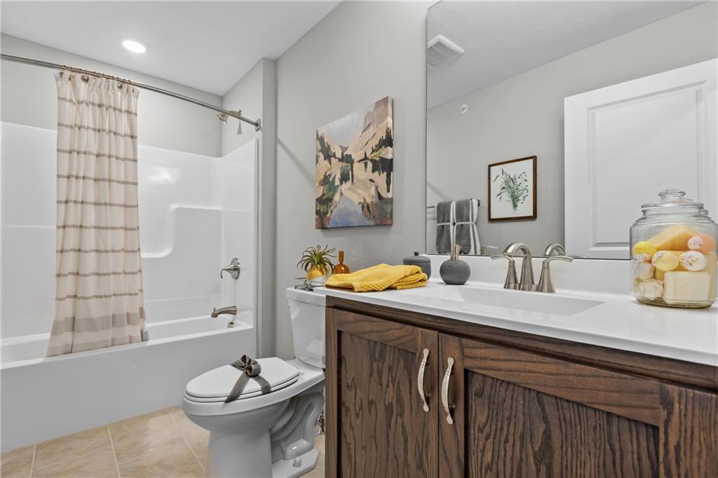 106 Independence Drive Cabot, PA 16023 - Photo 29 of 32 a view of a bathroom with a sink and a mirror