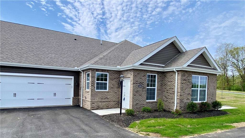 106 Independence Drive Cabot, PA 16023 - Photo 3 of 32 front view of a house with a yard