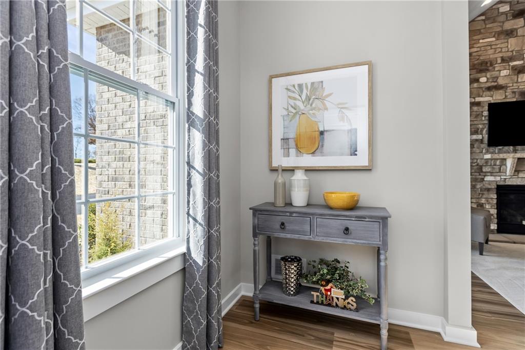 106 Independence Drive Cabot, PA 16023 - Photo 9 of 32 a living room with furniture and a fireplace
