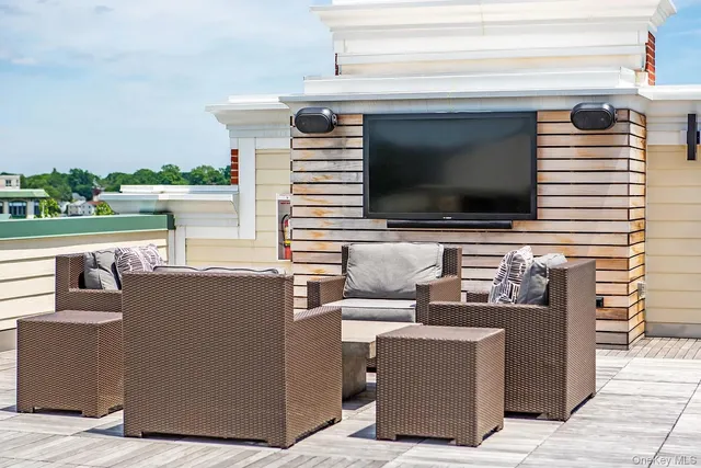 a view of a living room and a flat screen tv