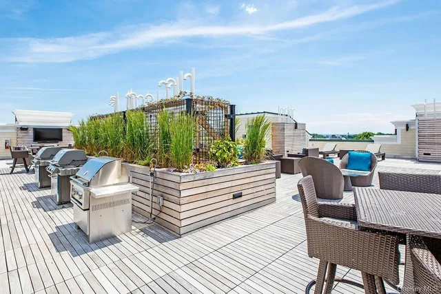 a view of a balcony with chairs