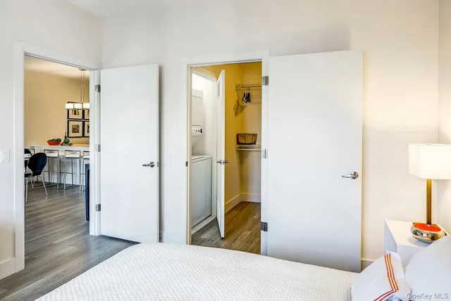 a bedroom with a bed and a table