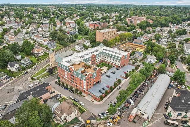 an aerial view of a city with lots of residential buildings