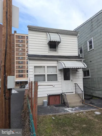 a view of a house with a patio
