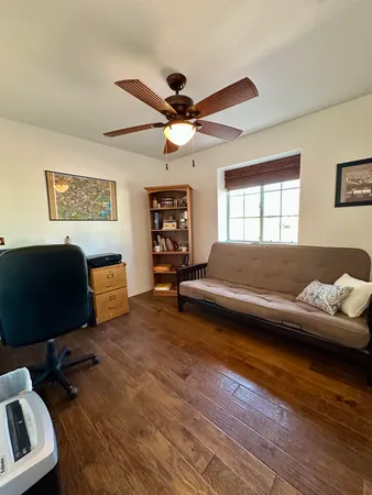 a bedroom with a bed furniture and a window