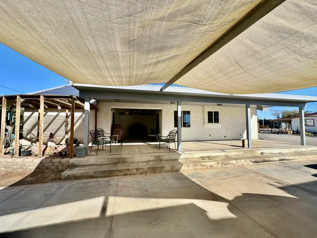 a view of a flesh screen tv and living room