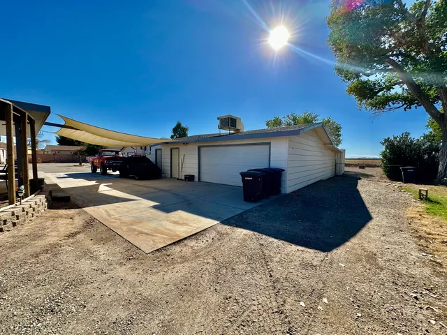 a view of a street with cars