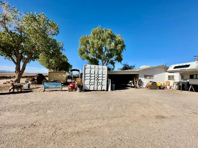 a view of street with parked cars
