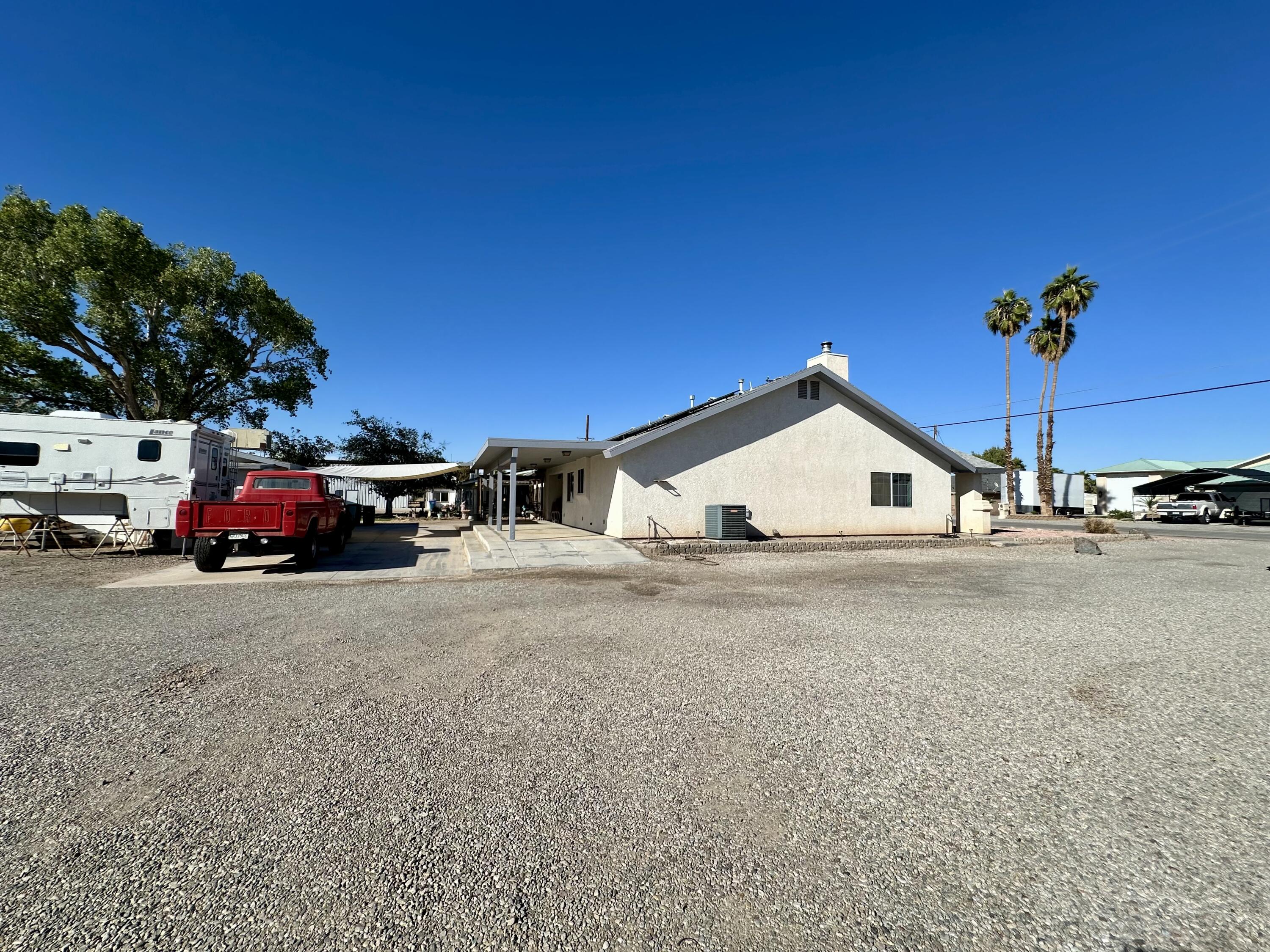 1731 Riviera Drive Blythe, CA 92225 - Photo 32 of 36 a view of a car parked on the side of the road