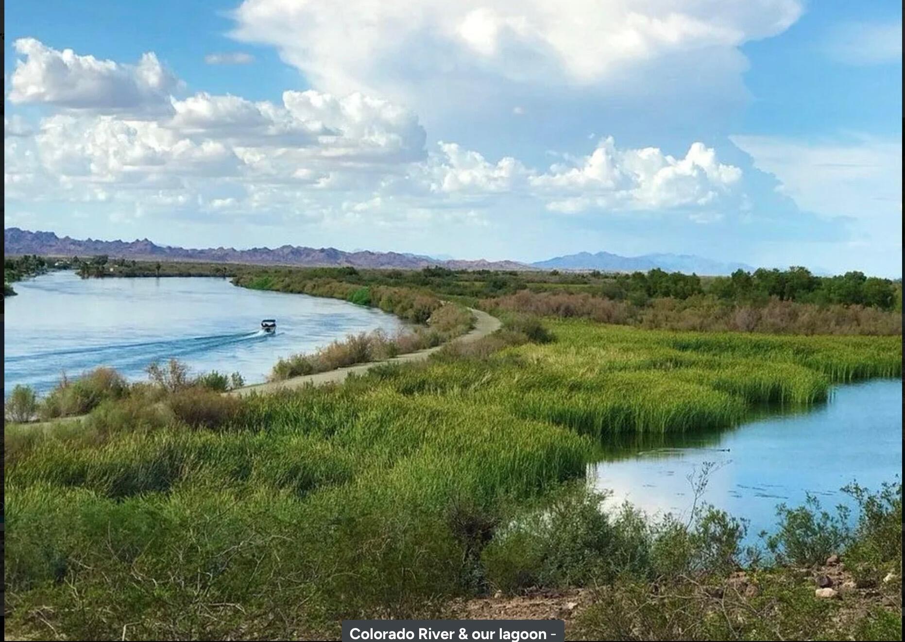 1731 Riviera Drive Blythe, CA 92225 - Photo 33 of 36 a view of a lake and green valley
