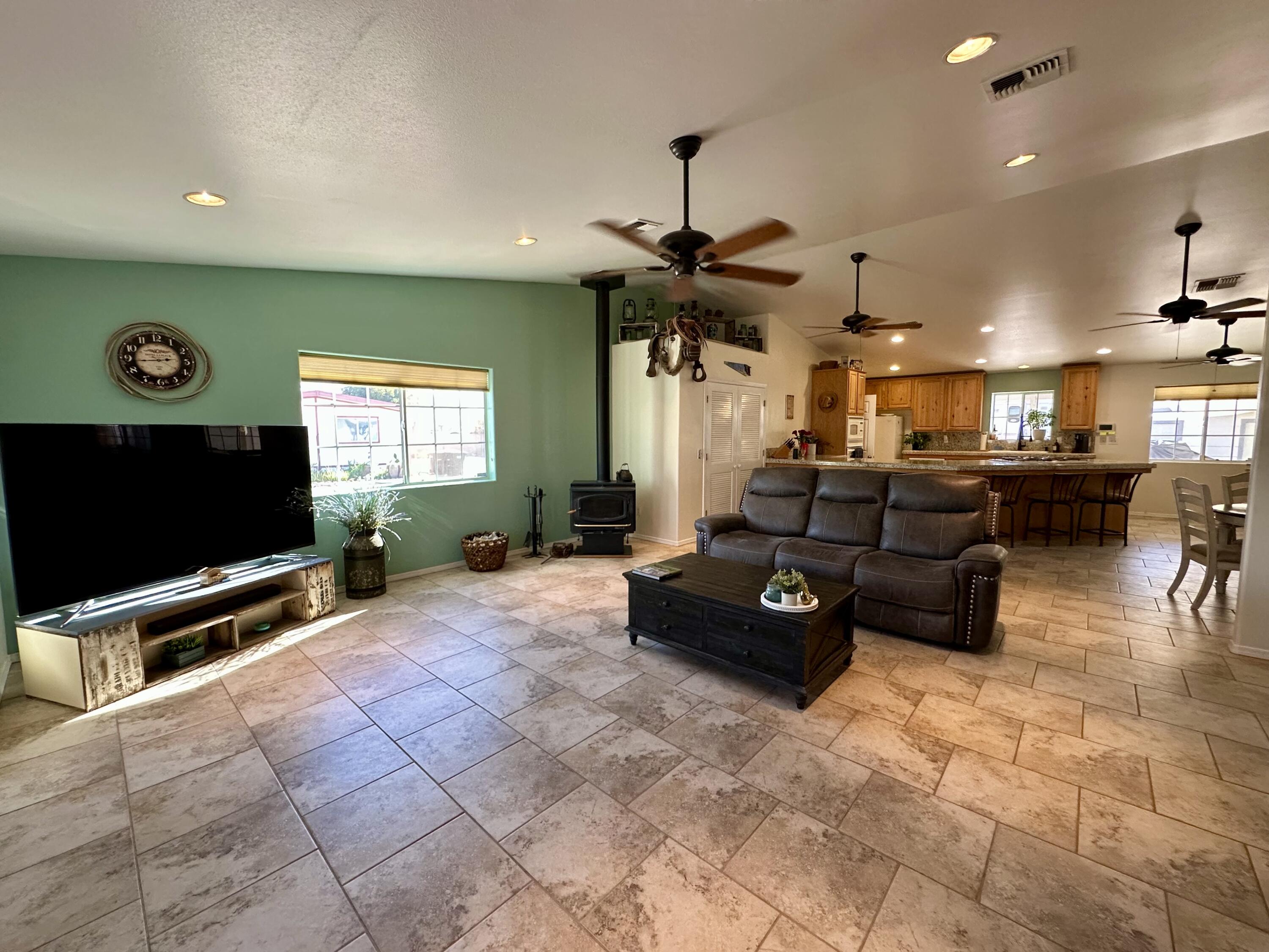 1731 Riviera Drive Blythe, CA 92225 - Photo 4 of 36 a living room with furniture and a flat screen tv