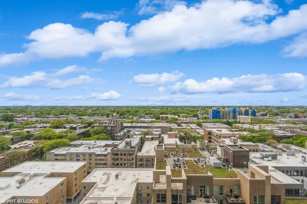 a view of city with tall buildings