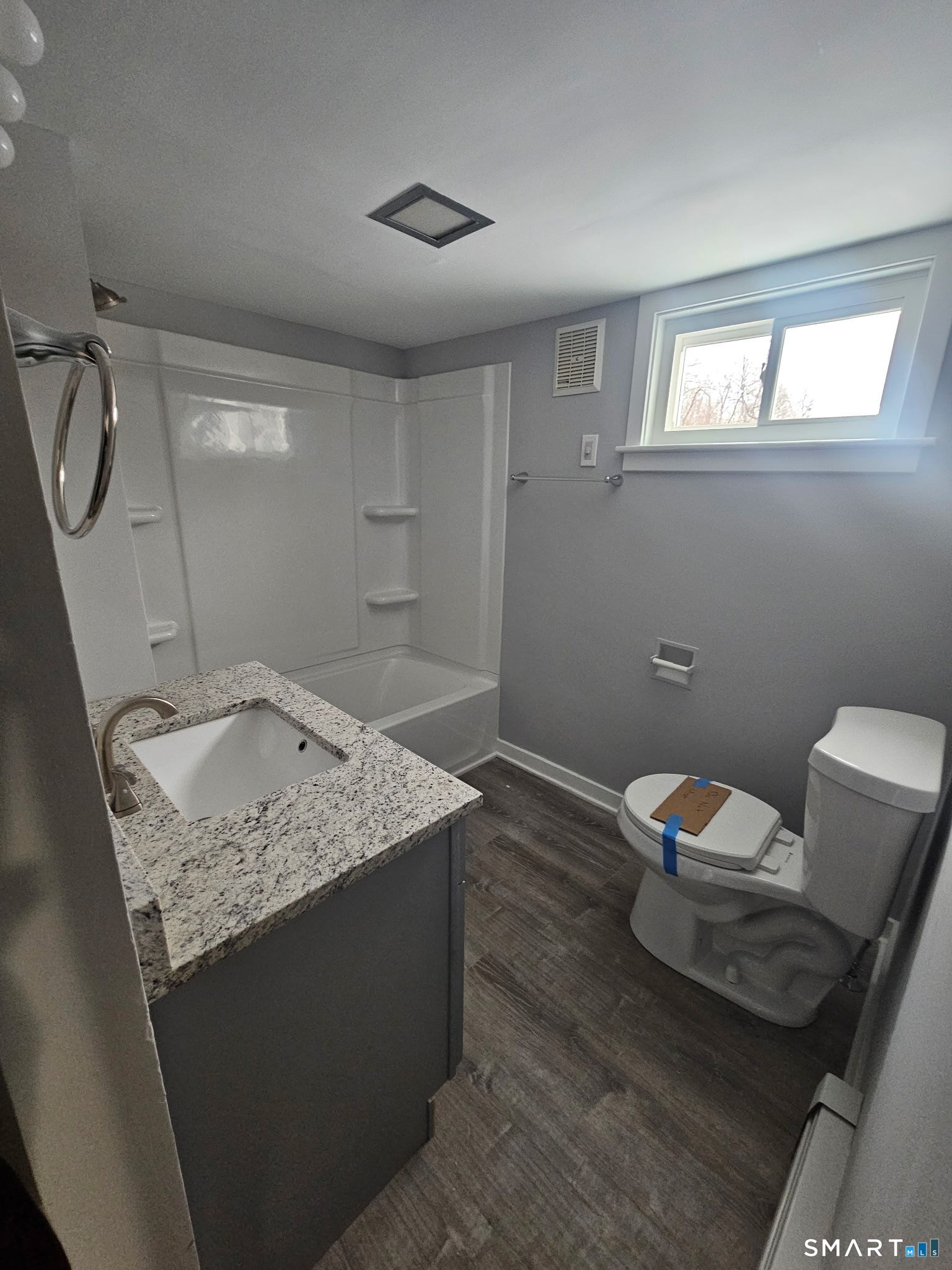 35 Morris Road Prospect, CT 06712 - Photo 2 of 19 a bathroom with a granite countertop sink a toilet and a mirror
