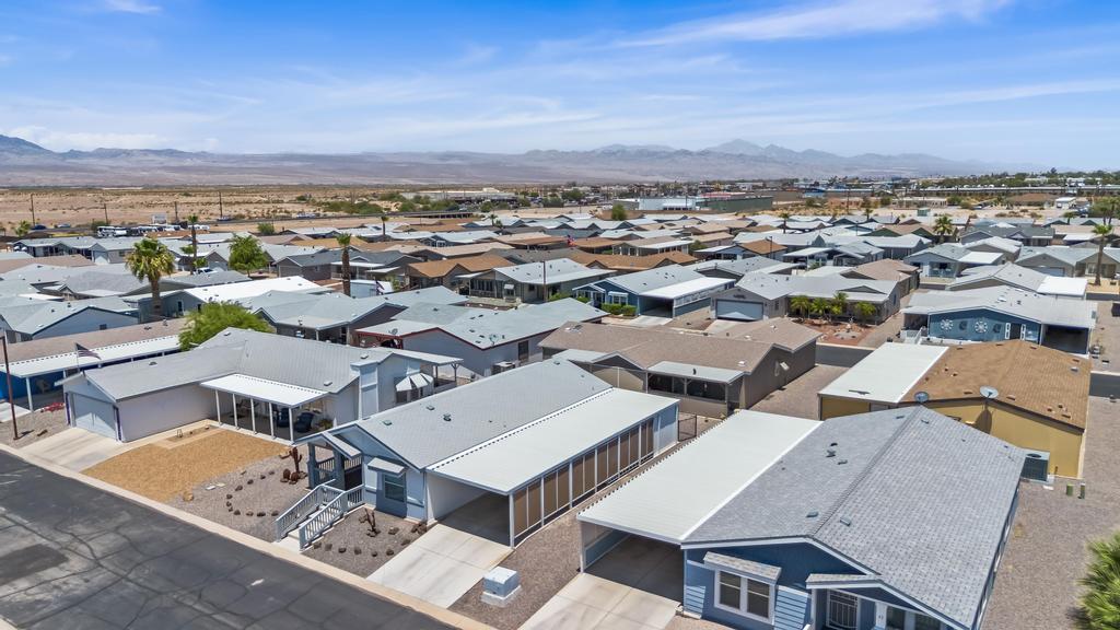 1545 East El Rodeo Road, Unit 42 Fort Mohave, AZ 86426 - Photo 5 of 45 an aerial view of a city with lots of residential buildings
