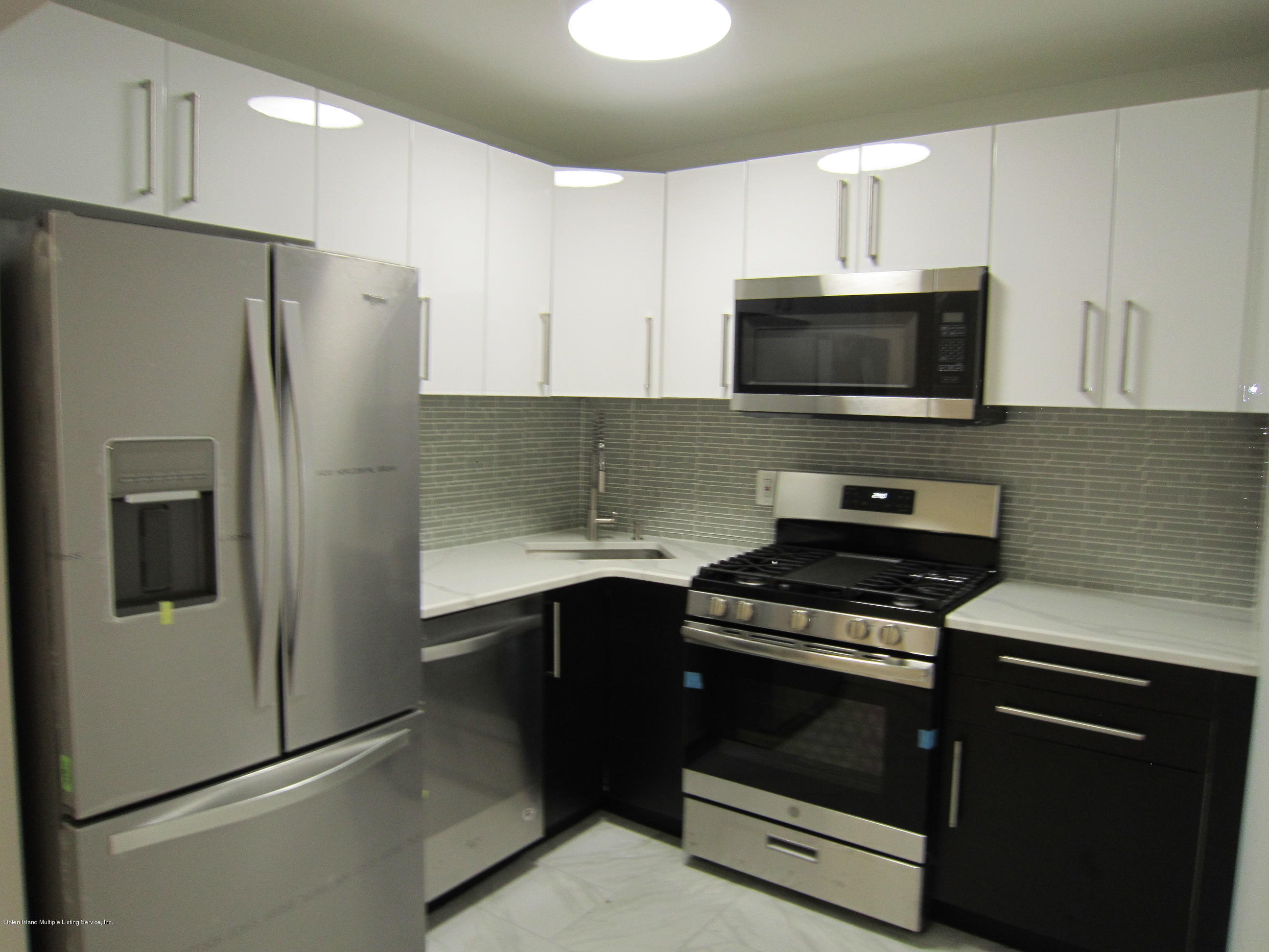 62 Timber Ridge Drive, Unit 2 Staten Island, NY 10306 - Photo 4 of 19 IMG_2786