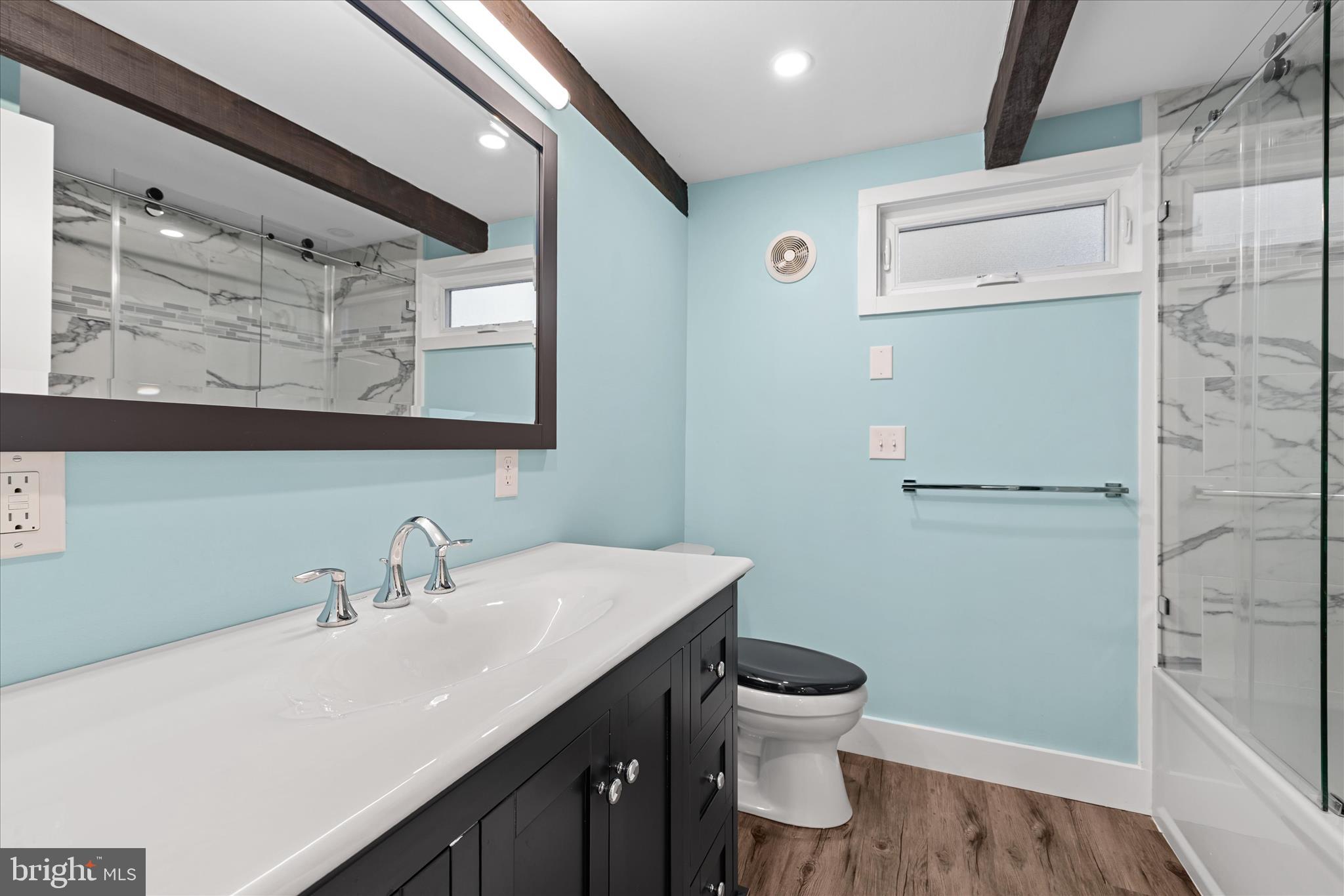 2 Bridge Road Bethany Beach, DE 19930 - Photo 30 of 65 a bathroom with a sink a toilet and shower