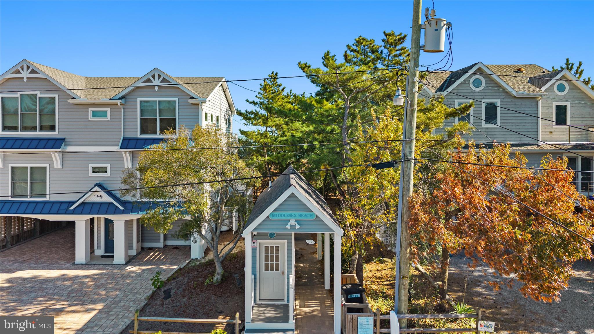 2 Bridge Road Bethany Beach, DE 19930 - Photo 52 of 65 front view of a house with a small yard