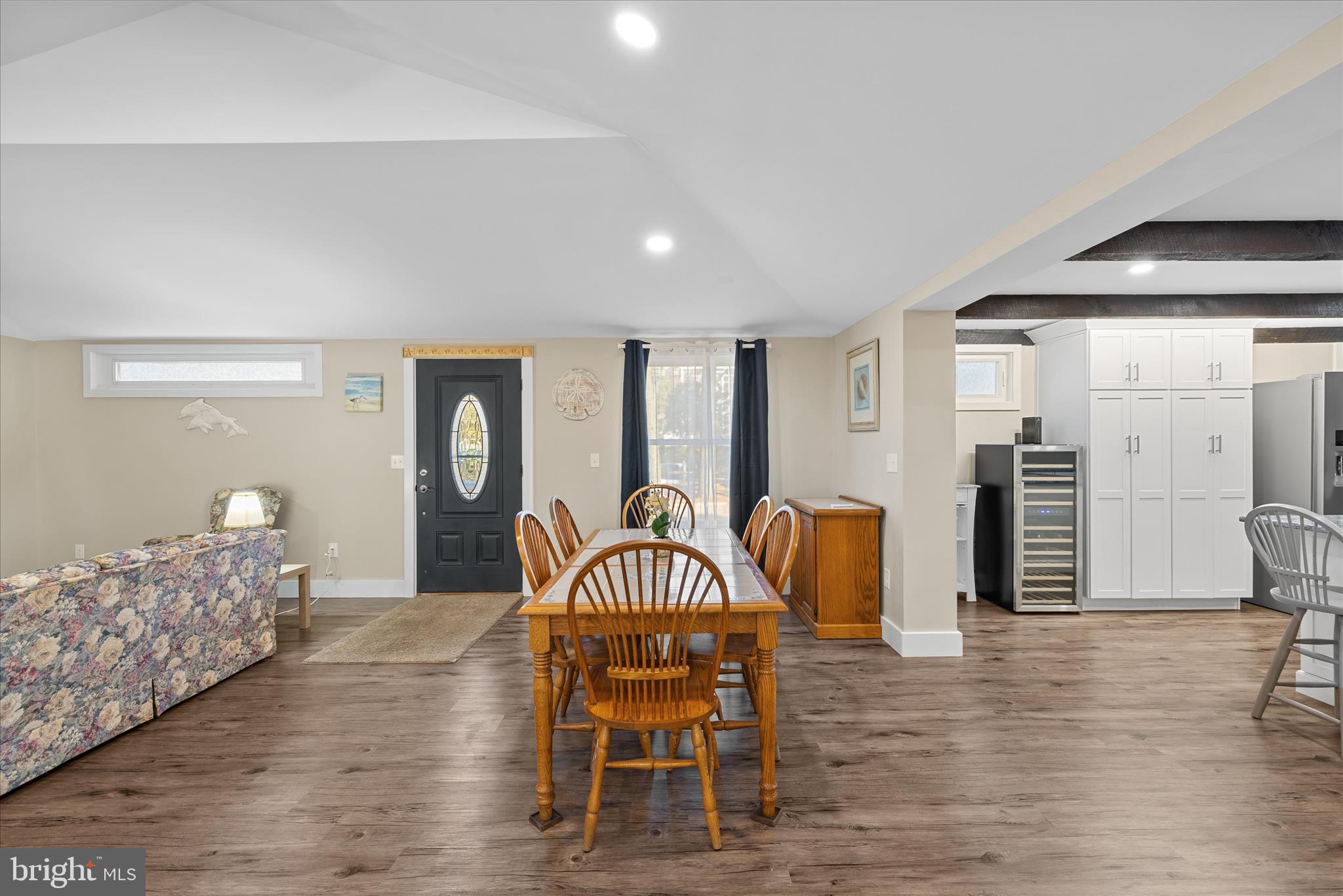 2 Bridge Road Bethany Beach, DE 19930 - Photo 10 of 65 a living room with furniture and a wooden floor