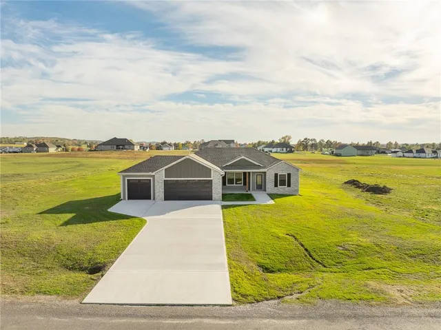 $520,000 | 6724 Tucker Drive, Odessa, MO 64076