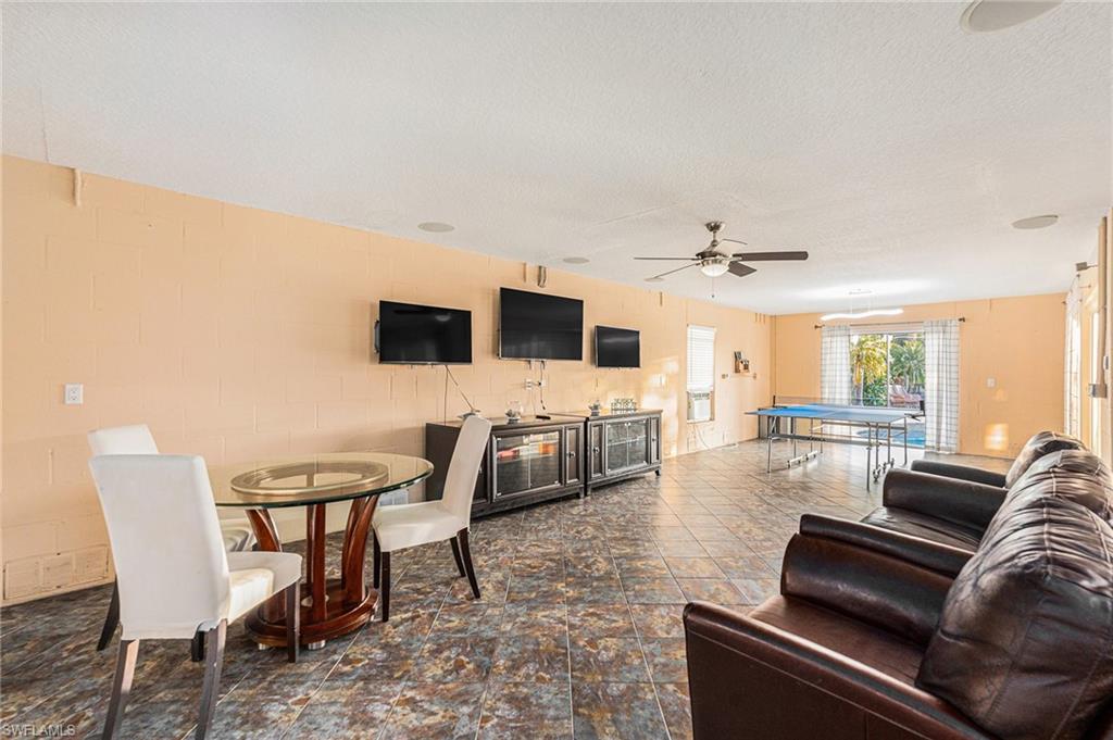 1316 Apollo Beach Boulevard South Apollo Beach, FL 33572 - Photo 29 of 47 a living room with furniture and a flat screen tv