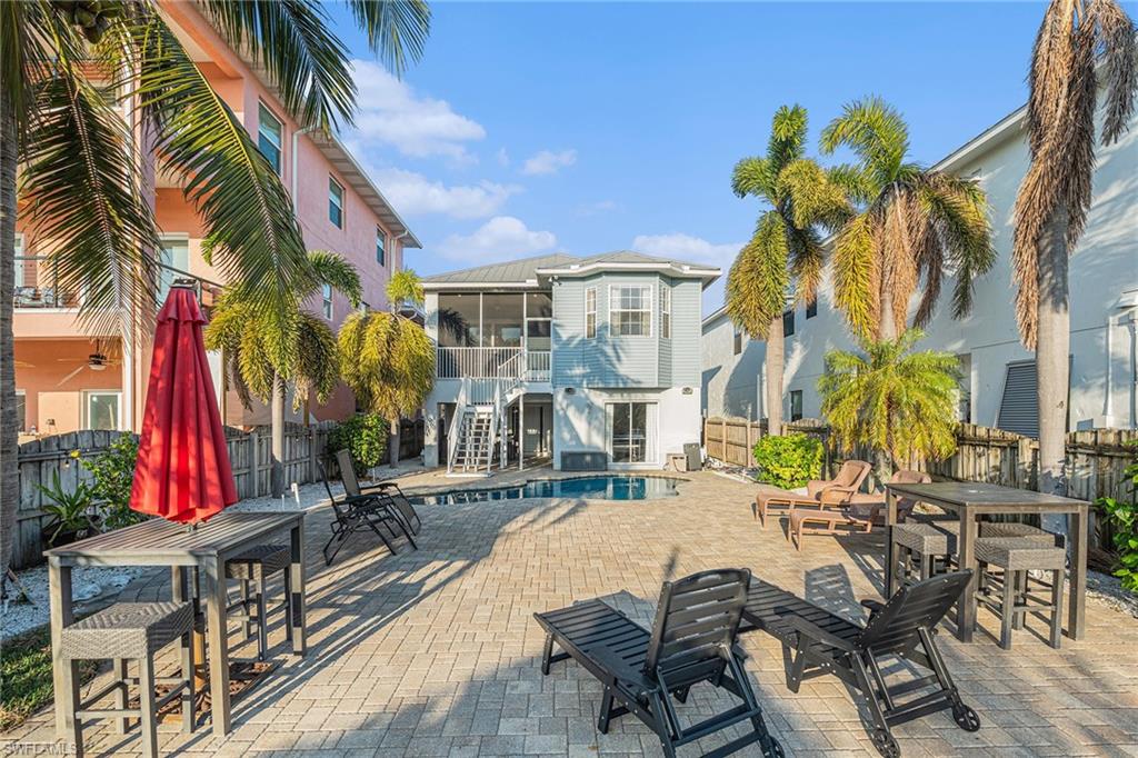 1316 Apollo Beach Boulevard South Apollo Beach, FL 33572 - Photo 35 of 47 a view of a chairs and table in patio