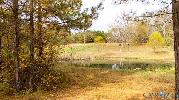 a view of a patio with table and chairs