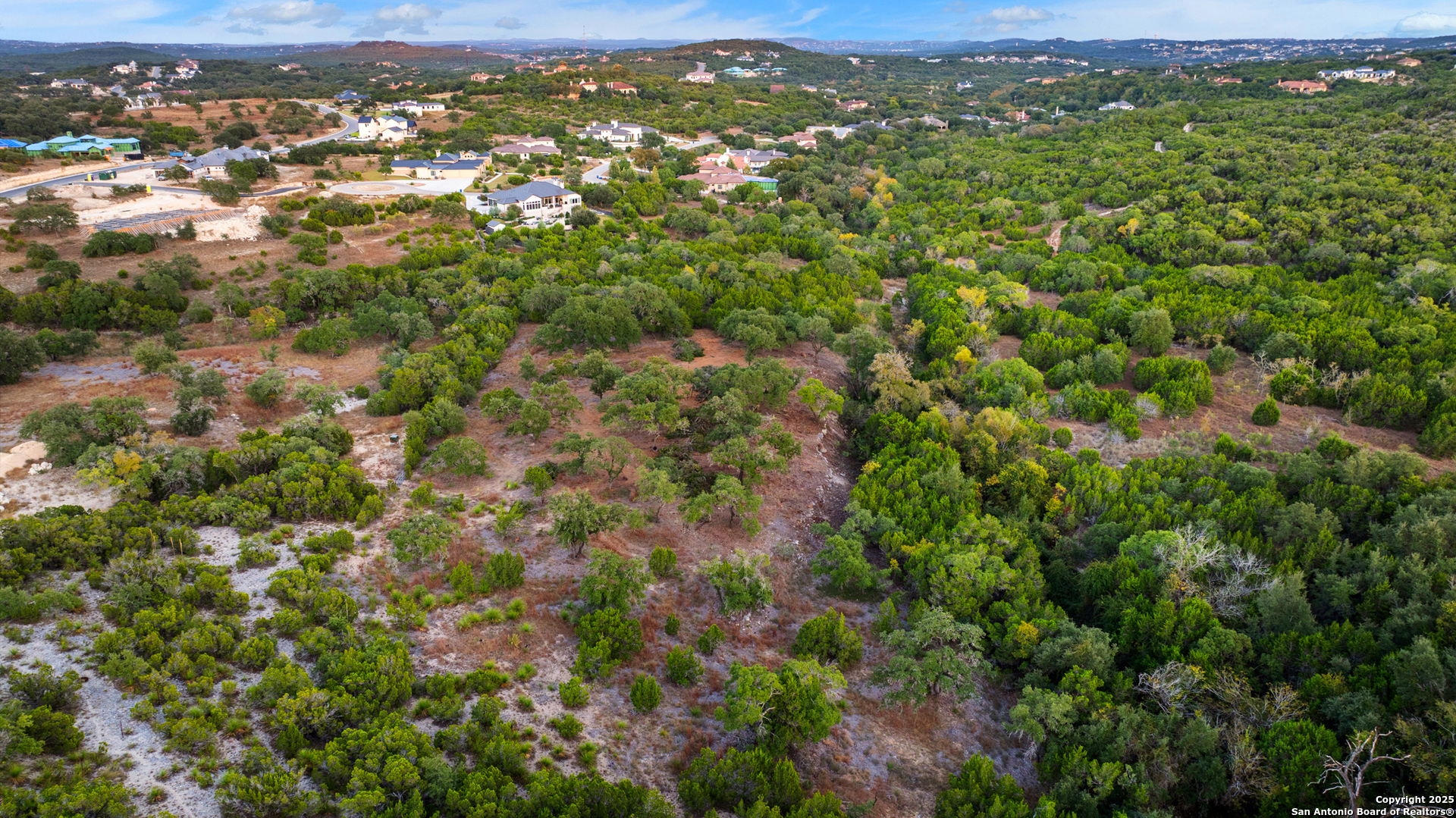 25722 Eden Point Boerne, TX 78006 - Photo 40 of 46 an aerial view of residential houses with outdoor space and trees