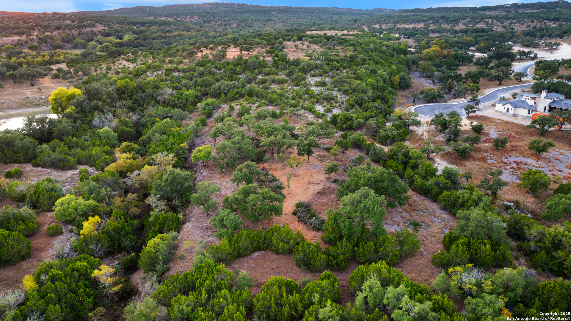 25722 Eden Point Boerne, TX 78006 - Photo 44 of 46 an aerial view of residential houses with outdoor space and trees