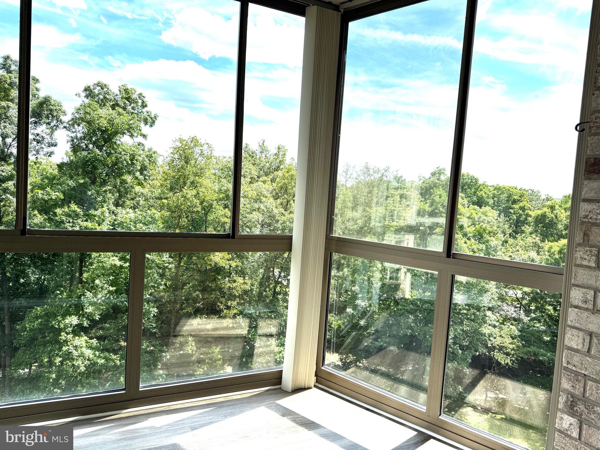 19375 Cypress Ridge Terrace, Unit 404 Leesburg, VA 20176 - Photo 5 of 8 Sunroom view East