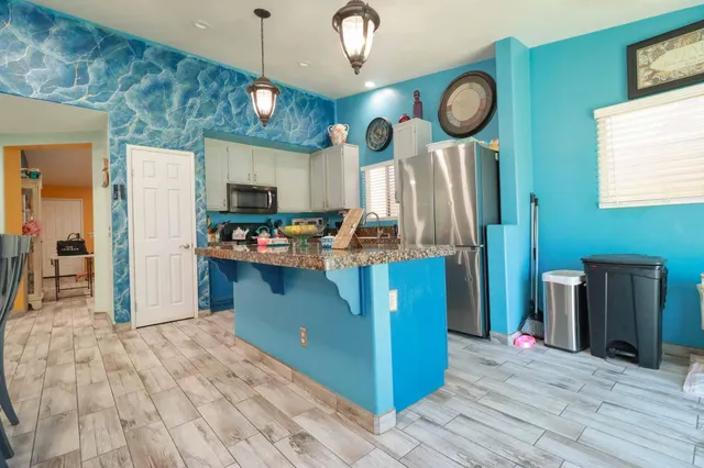 a view of a dining room with furniture