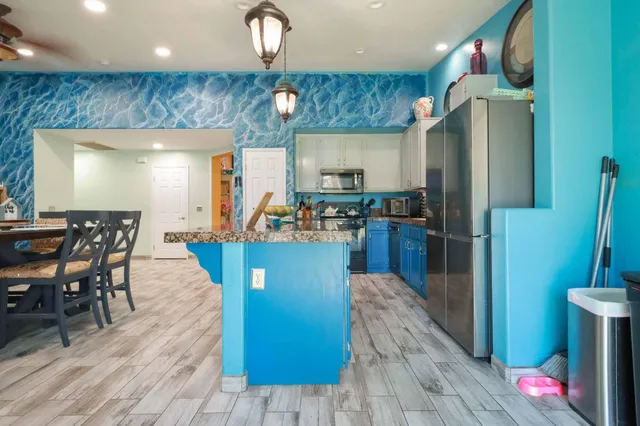 a view of a dining room with furniture