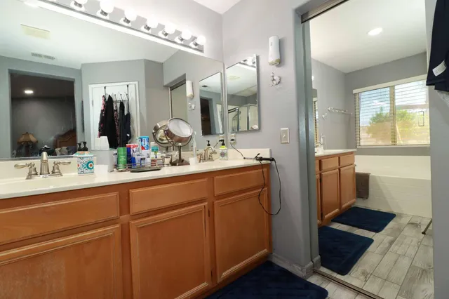 a bed room with a bed and a window