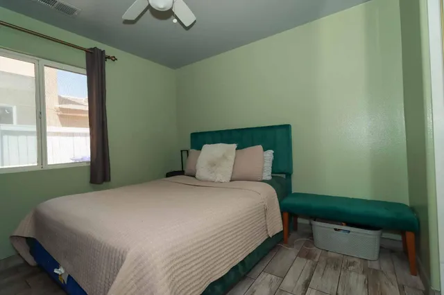 a view of storage and utility room with washer and dryer
