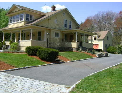 41 Hall Road Chelmsford, MA 01824 - Photo 1 of 1 a front view of a house with a yard and garage