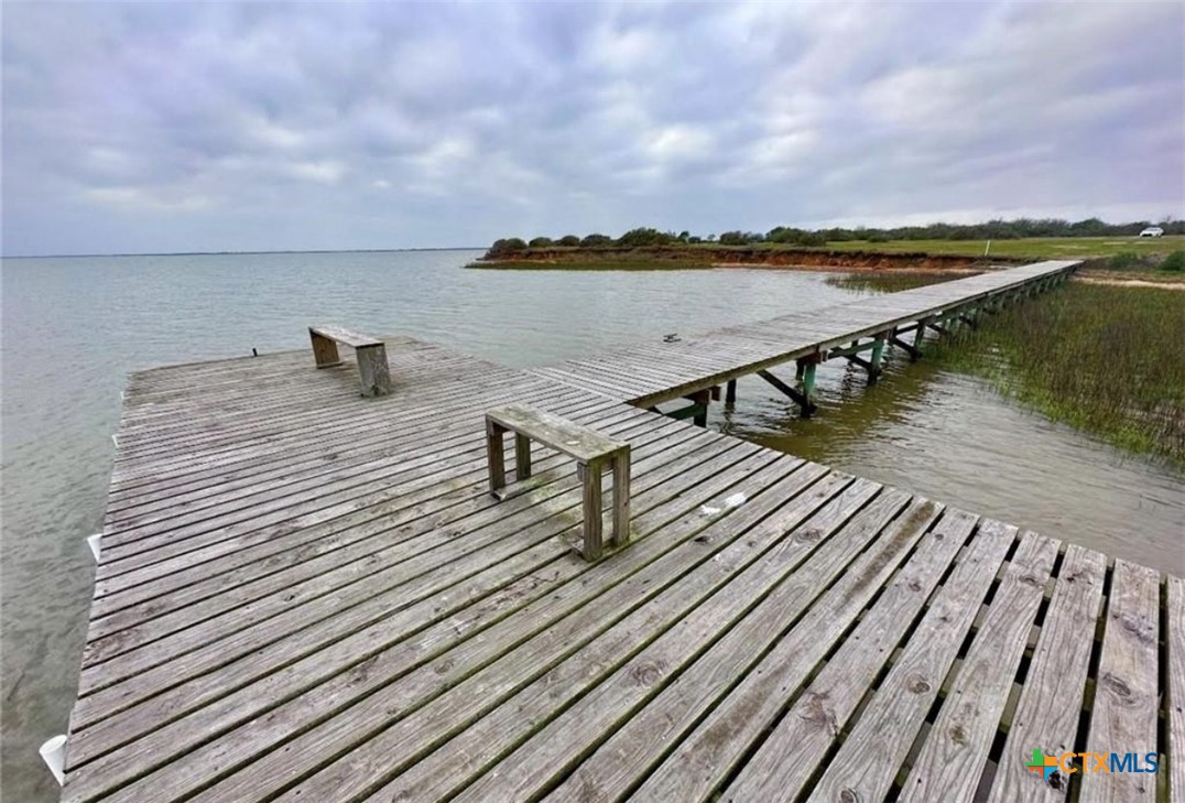 61 Falcon Way Palacios, TX 77465 - Photo 6 of 22 a view of swimming pool with seating space