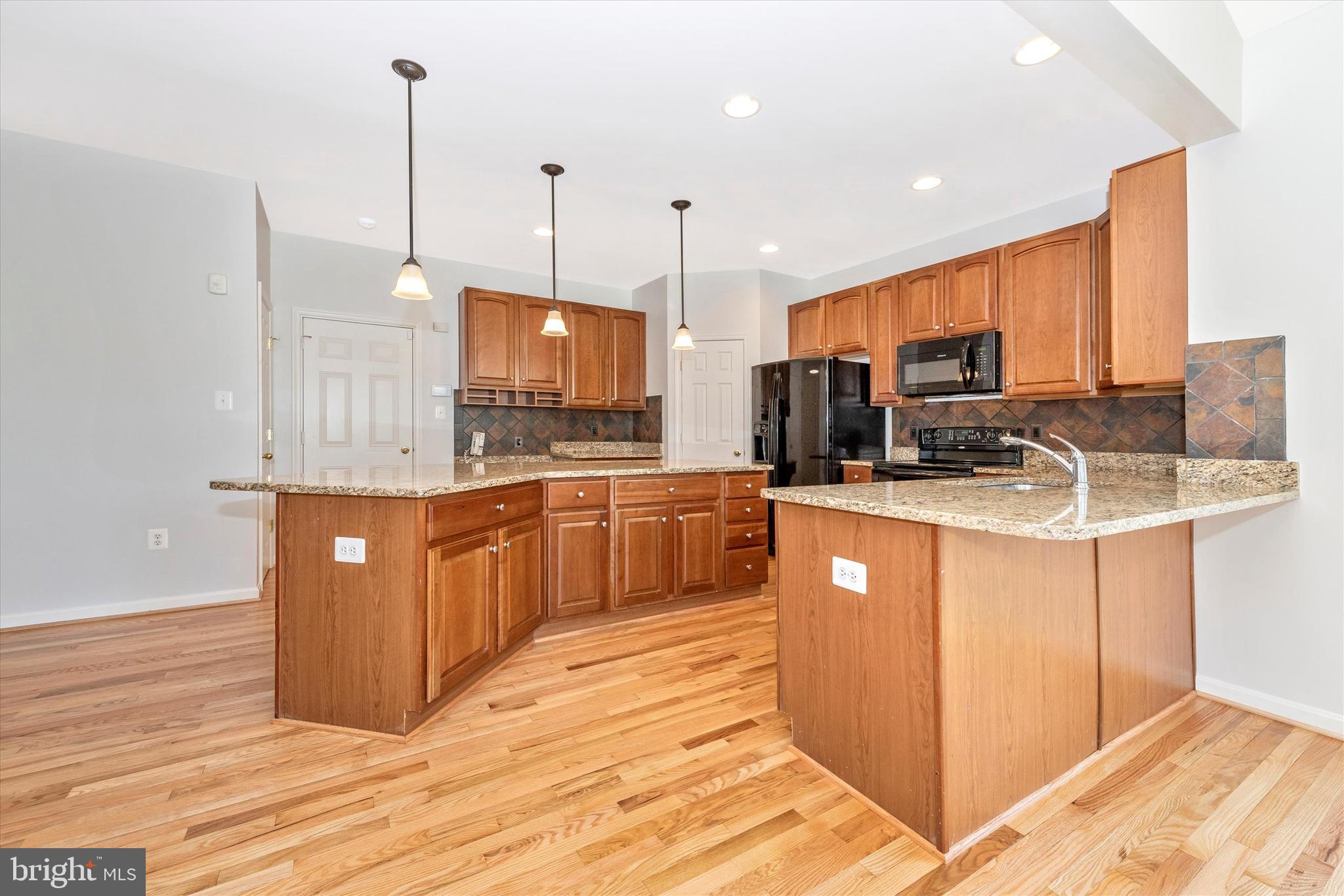 116 Wheeler Lane Frederick, MD 21702 - Photo 12 of 35 Island seating for those quick meals!