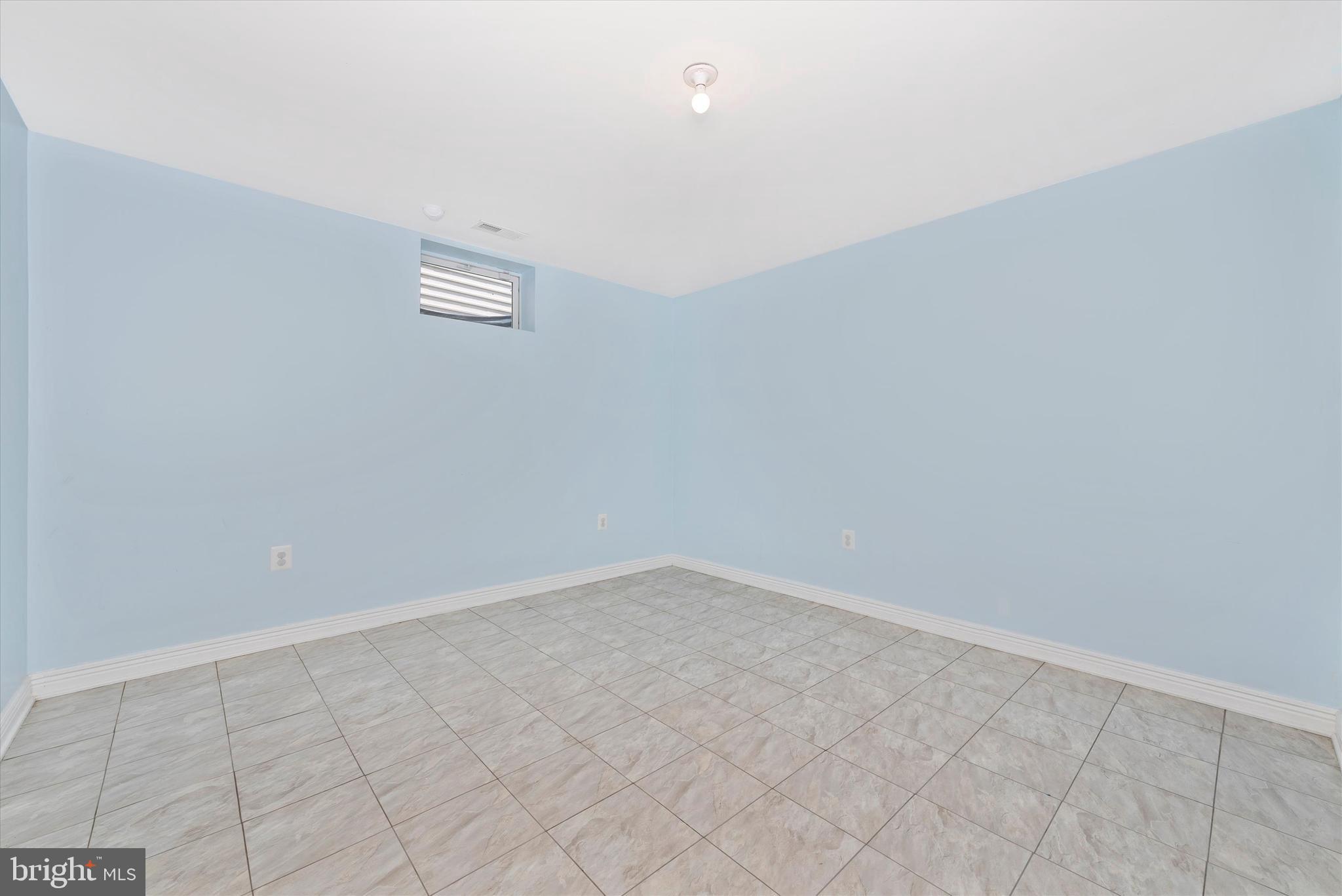 116 Wheeler Lane Frederick, MD 21702 - Photo 28 of 35 Craft room... tile floor...