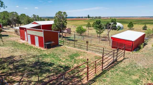 a view of a terrace with wooden fence