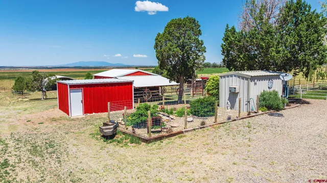 a view of backyard with deck