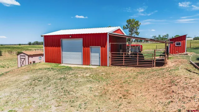 a view of a patio with a yard