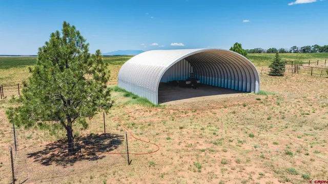 a view of a backyard of a house