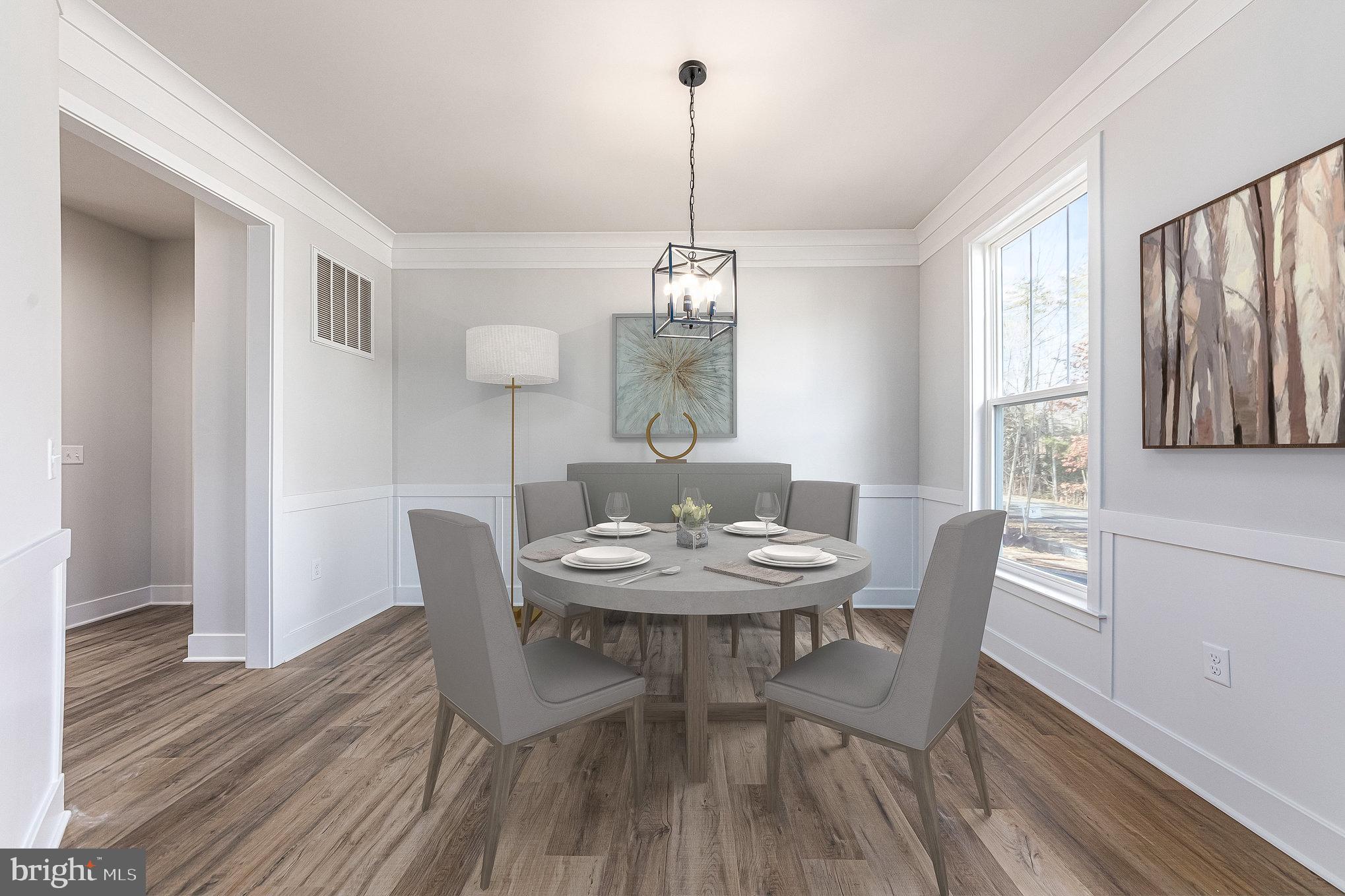 627 Rock Hill Church Road Stafford, VA 22556 - Photo 11 of 54 a view of a dining room with furniture window and wooden floor