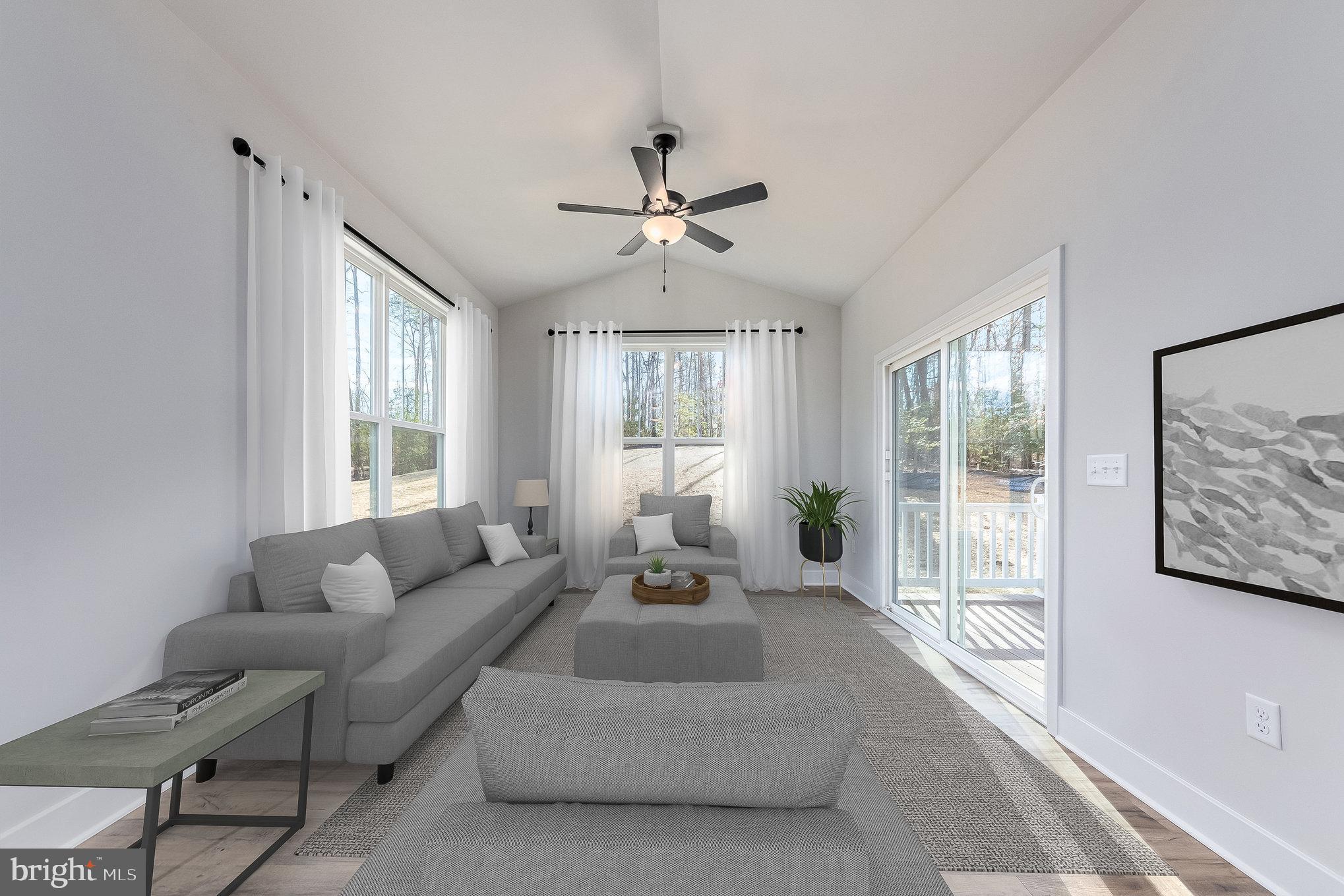 627 Rock Hill Church Road Stafford, VA 22556 - Photo 13 of 54 a living room with furniture large window and flat screen tv