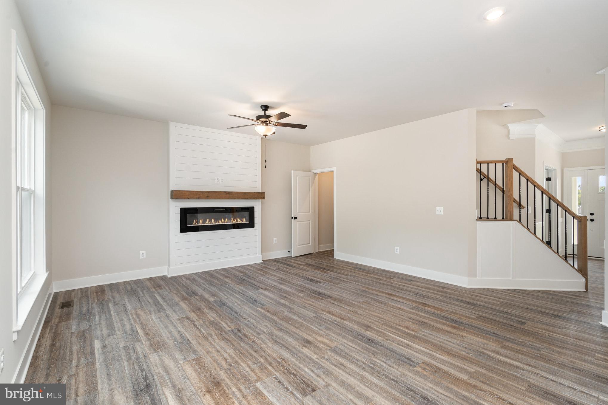 627 Rock Hill Church Road Stafford, VA 22556 - Photo 5 of 54 a view of an empty room with wooden floor