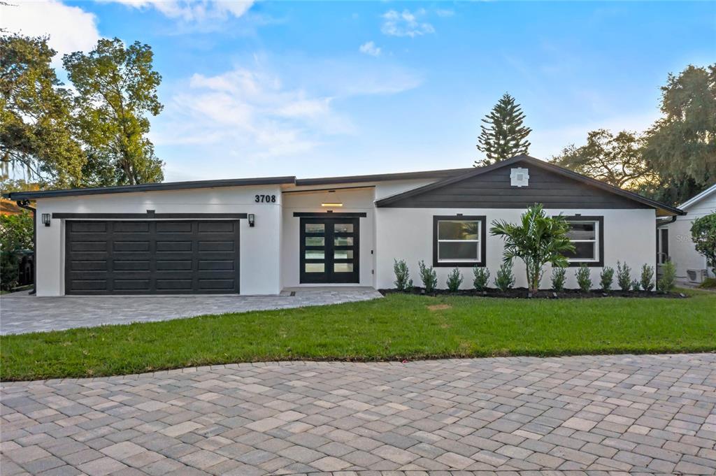 3708 Oakview Drive Orlando, FL 32812 - Photo 1 of 1 a front view of house with yard